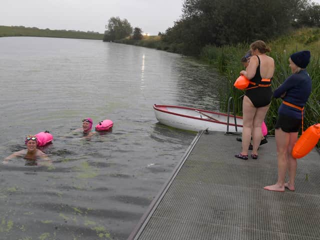 Vikki Chester and Sheila Deith in the water.