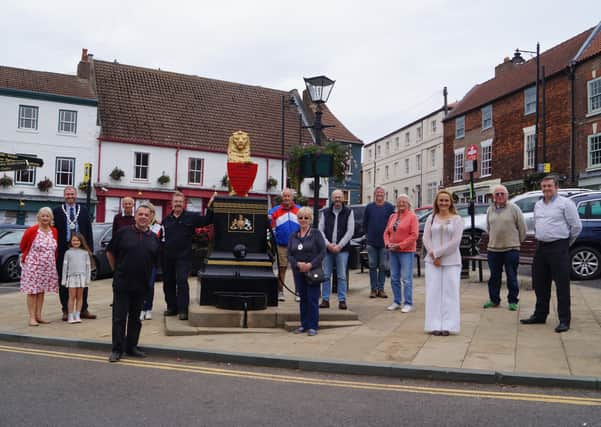 Town councillors admire the work done by craftsmen Colin Rust (centre left) and Graham Bridges. EMN-200209-172824001