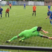 Lee Beeson nets a penalty in last season's victory over Lutterworth.