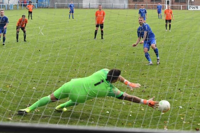 Lee Beeson nets a penalty in last season's victory over Lutterworth.