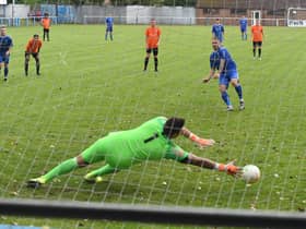 Lee Beeson nets a penalty in last season's victory over Lutterworth.