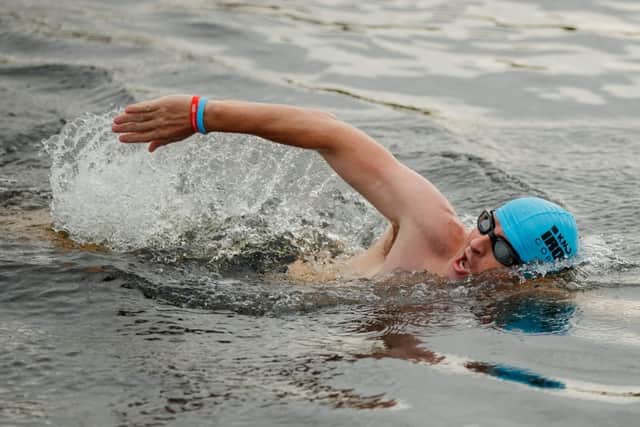 Captain Harry Grantham on an early morning training swim. Photo: British Army EMN-200409-211521001