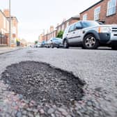 Potholes in Queen Street. Picture: John Aron.