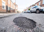 Potholes in Queen Street. Picture: John Aron.