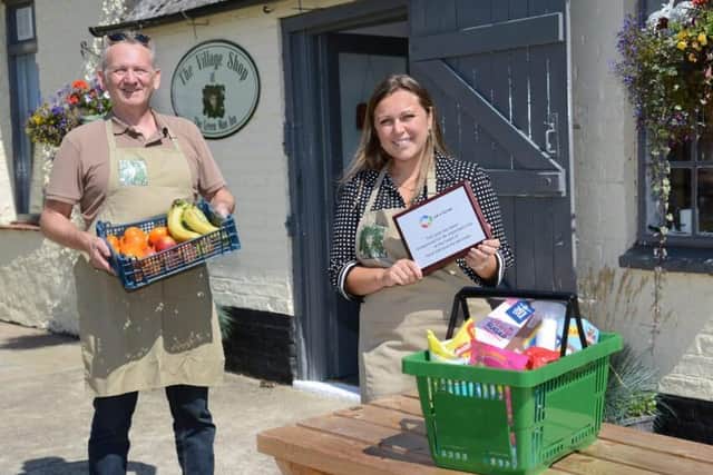 Richard Bradley (co-owner) and Jade Dillon (manager).