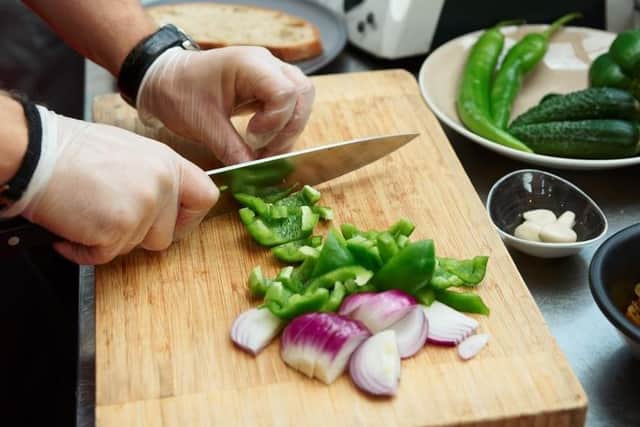 Preparing food in a restaurant kitchen (stock image)