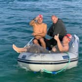 He's done it! Capt Harry Grantham heads back to his support boat after swimming the English Channel. EMN-201109-092744001