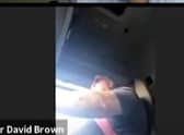 Coun Brown at the wheel during the meeting