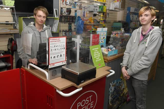 Pop-up Post Office at Pop-In Bargains. L-R Lee Taylor - post master, Corey Odam - post office assistant. EMN-200914-094006001
