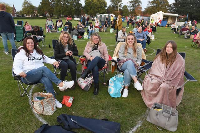 Open air cinema on Boston's Central Park. L-R Jenna Hiley, Anita Wingate, Leanna Wray, Leah Wingate, Jolie Hiley. EMN-200914-135417005