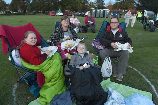 Open air cinema on Boston's Central Park. Suzanna Sanderson and Gareth Sanderson with Amber Sanderson 9 and Charlie Sanderson 5 of Boston. EMN-200914-135458005