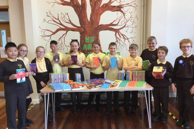 Miss Abi Johnson and Miss Emma Green took this photo of their Year 6 pupils receiving the gift for all the pupils.