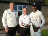 Pothula collects his Man of the Match champagne from umpires Nick Law and Paul Goodhand.