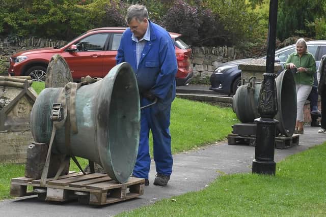 Ruskington church being taken away for repair. Graham Clifton, bell hanger for White's of Appleton. EMN-200921-170156001