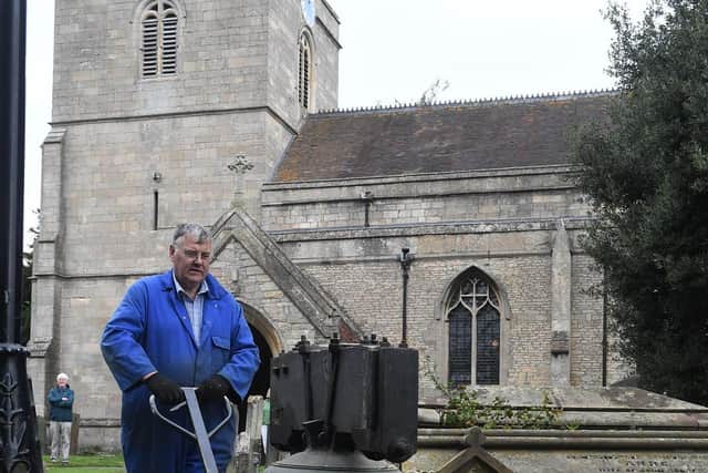 Ruskington church being taken away for repair. Graham Clifton, bell hanger for White's of Appleton. EMN-200921-170207001