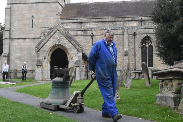 Ruskington church being taken away for repair. Graham Clifton, bell hanger for White's of Appleton. EMN-200921-165953001