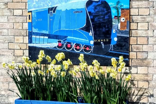 Artwork and flowers - the perfect combination