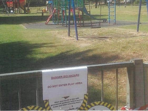 The sign stating the play area had been declared a bio hazard