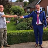 Harry Kerman receives his award from the Mayor of Louth, Councillor Darren Hobson.