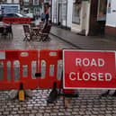 Barriers have been erected and tables and chairs placed outside Pop Inn Cafe. Picture: John Fieldhouse.