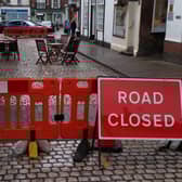 Barriers have been erected and tables and chairs placed outside Pop Inn Cafe. Picture: John Fieldhouse.