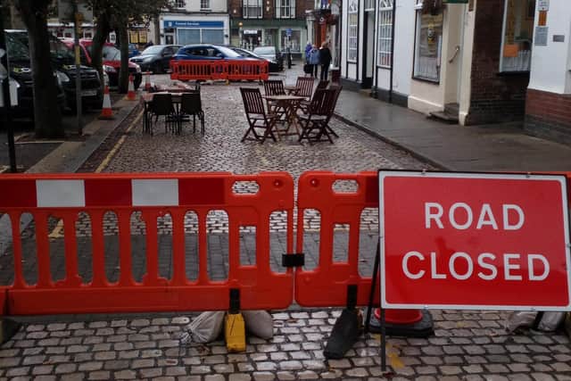 Barriers have been erected and tables and chairs placed outside Pop Inn Cafe. Picture: John Fieldhouse.