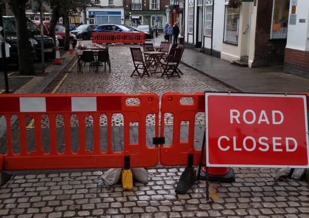 Barriers have been erected and tables and chairs placed outside Pop Inn Cafe. Picture: John Fieldhouse.
