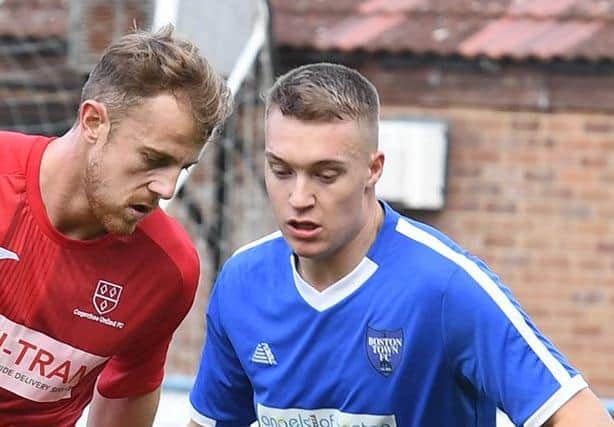 Corey Newman in action for Boston Town.