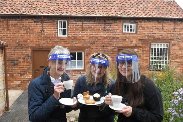 Macmillan coffee morning at Mrs Smith's Cottage. L-R Pauline Collett, Sue Moon and Jade John (heritage officer) EMN-200928-101907001