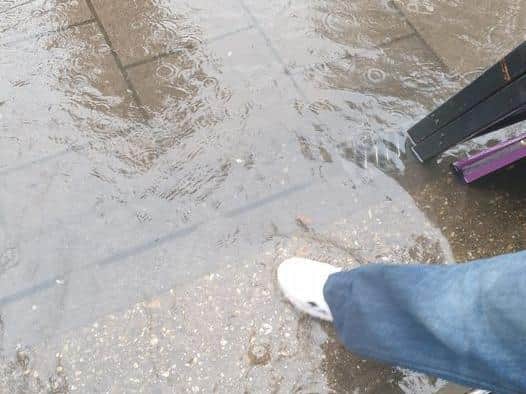 Rainwater levels rising on the pavement along Roman Bank in Skegness. Photo: Barry Robinson.