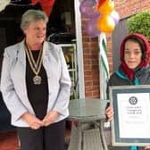 Eloise holds her award, alongside Rotary Club of Louth branch president Pam Ashley-Marsh.