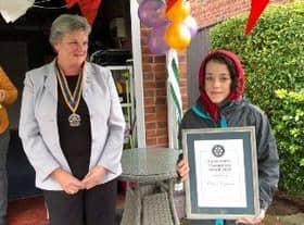 Eloise holds her award, alongside Rotary Club of Louth branch president Pam Ashley-Marsh.