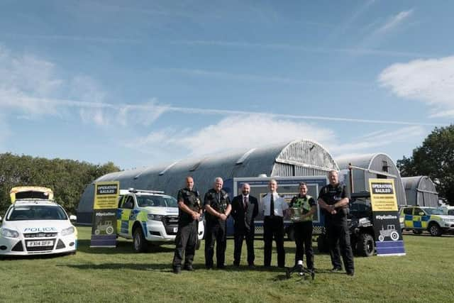 Chief Inspector Phil Vickers with PCC Marc Jones and other key players in the Operation Galileo team. EMN-200930-125400001