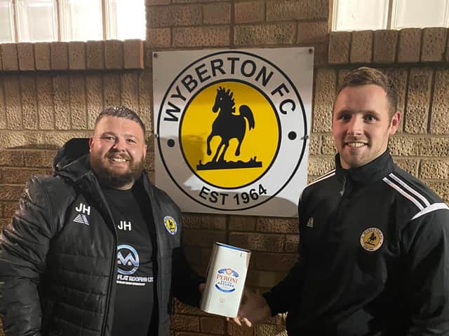 Man of the match Beck with manager Jamie Hanton.