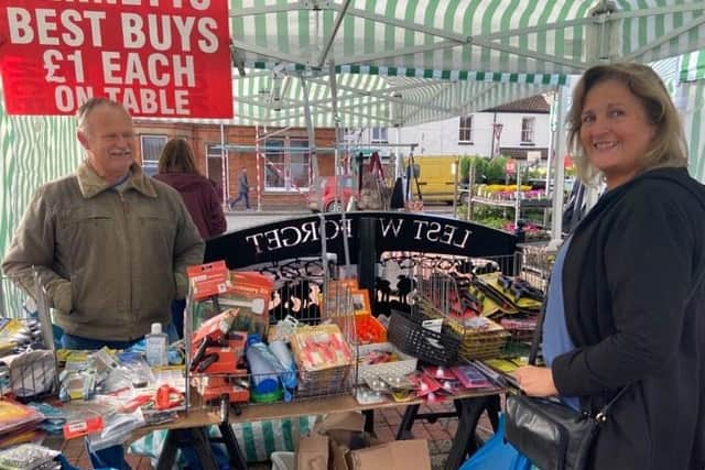 Roger Bennet's £1 stall is a popular attraction for bargain hunters like Tricia Clark.