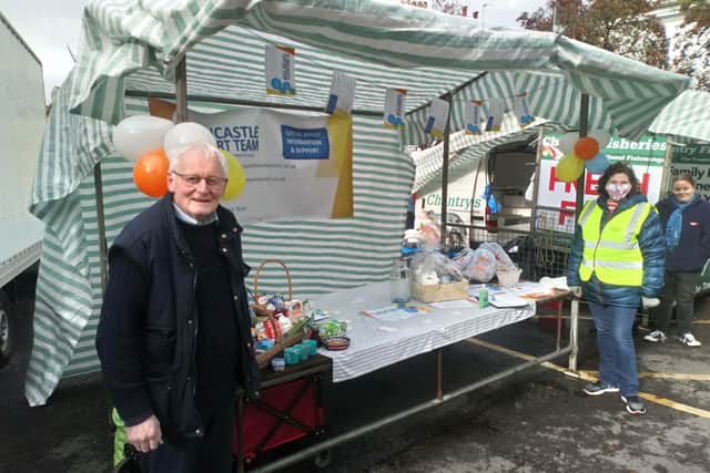 Councillor Aron pictured with representatives from the Horncastle Support Team at their market stall.