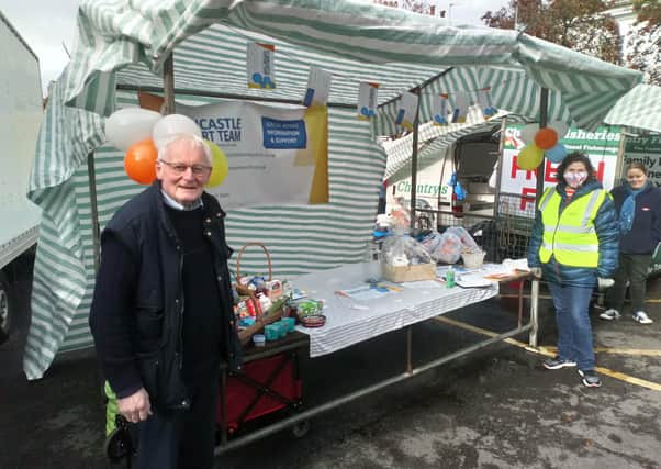 Councillor Aron pictured with representatives from the Horncastle Support Team at their market stall.