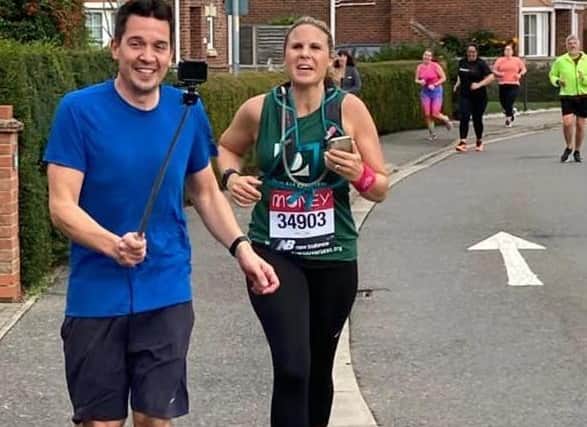 Sarah Baldock ran in Heckington to raise money for Vision Aid. Here on her last lap with husband Rob Baldock EMN-200510-163545001