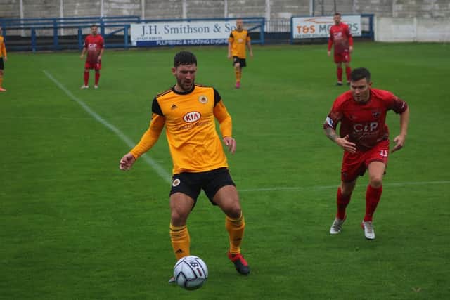 Andi Thanoj in action against Mansfield. Photo: Oliver Atkin.