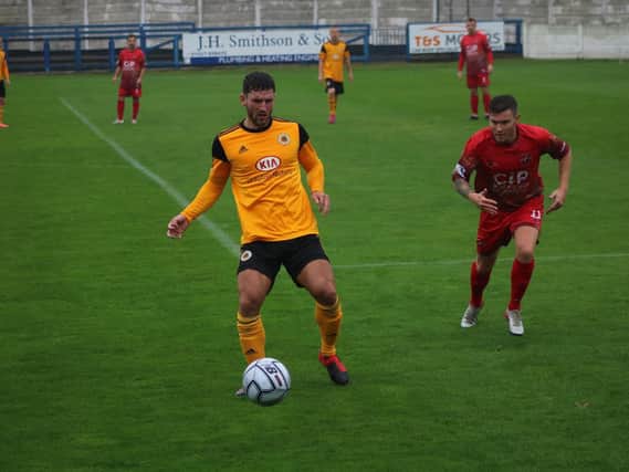 Andi Thanoj in action against Mansfield. Photo: Oliver Atkin.