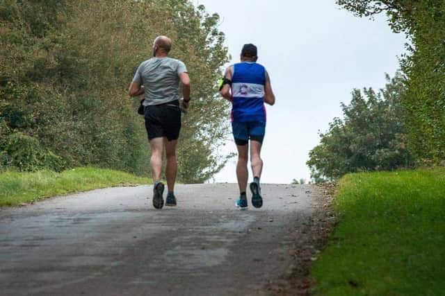 Simon Greenfield training alongside Kev Houghton.