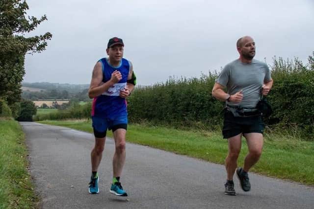 Simon Greenfield training for his marathon challenge, alongside Kev Houghton.