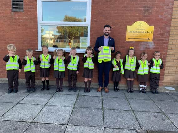 Richmond School pupils in their hi-vis vests donated by Specsavers.