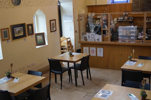 The cafe layout has been changed to allow more space EMN-201013-115940001