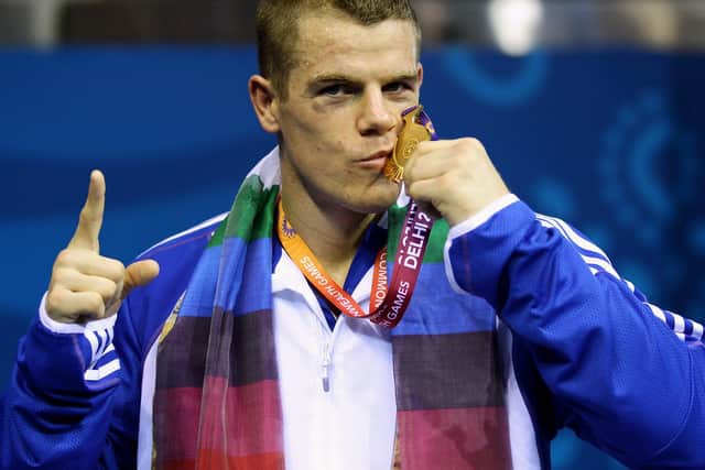 Johnson struck gold in Delhi. Photo: Getty Images