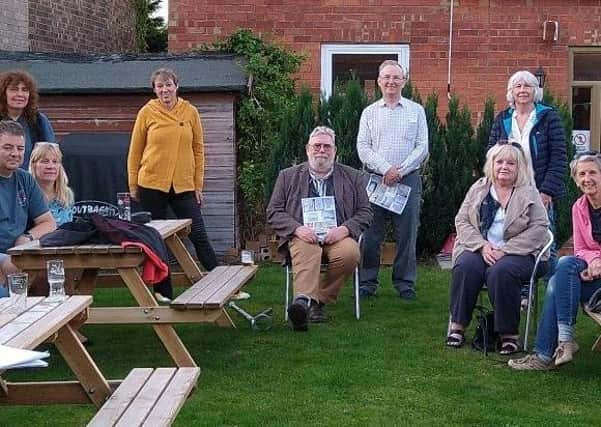 Cloun Rob Kendrick (centre standing) with members of the MATES group from Martin and Timberland, including founder member, Lindsay Fulton, (standing, far left). EMN-201015-145655001