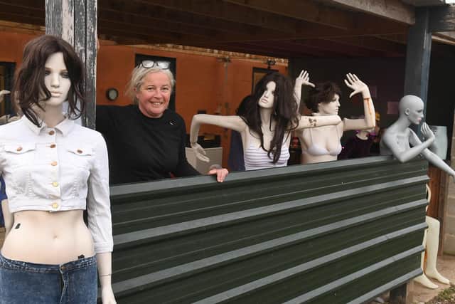 Mannakin owner Roz Edwards with just some of the thousands of mannequins.
