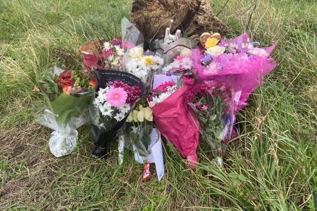 Some of the floral tributes left at the scene of the accident.