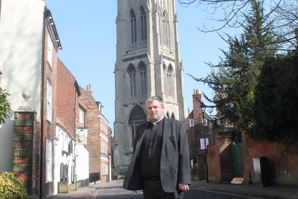 The Rector of Louth, Nick Brown, in front of St James’ Church.