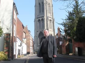 The Rector of Louth, Nick Brown, in front of St James’ Church.